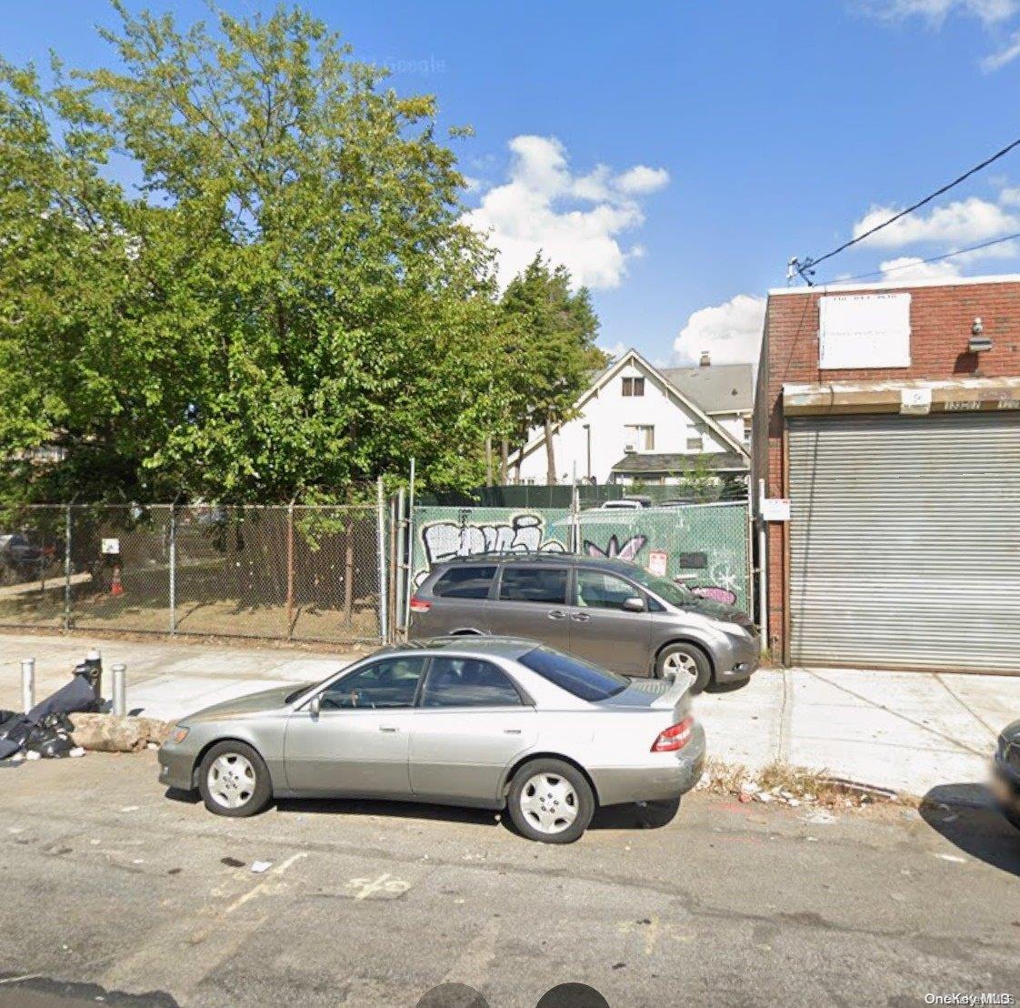 a view of a car parked in front of a house