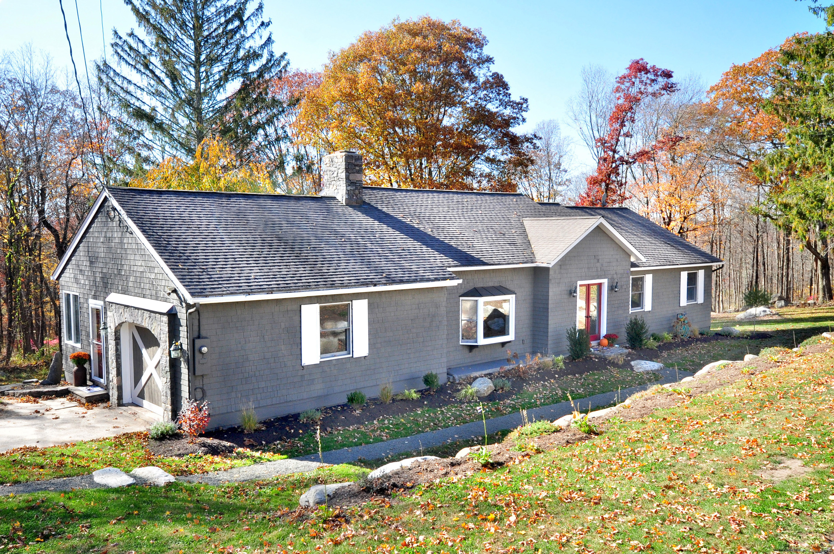 a view of house with yard