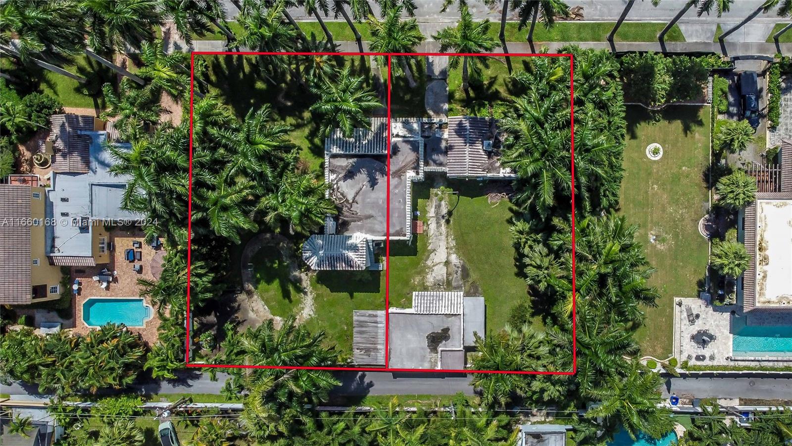 an aerial view of a house with a yard and garden