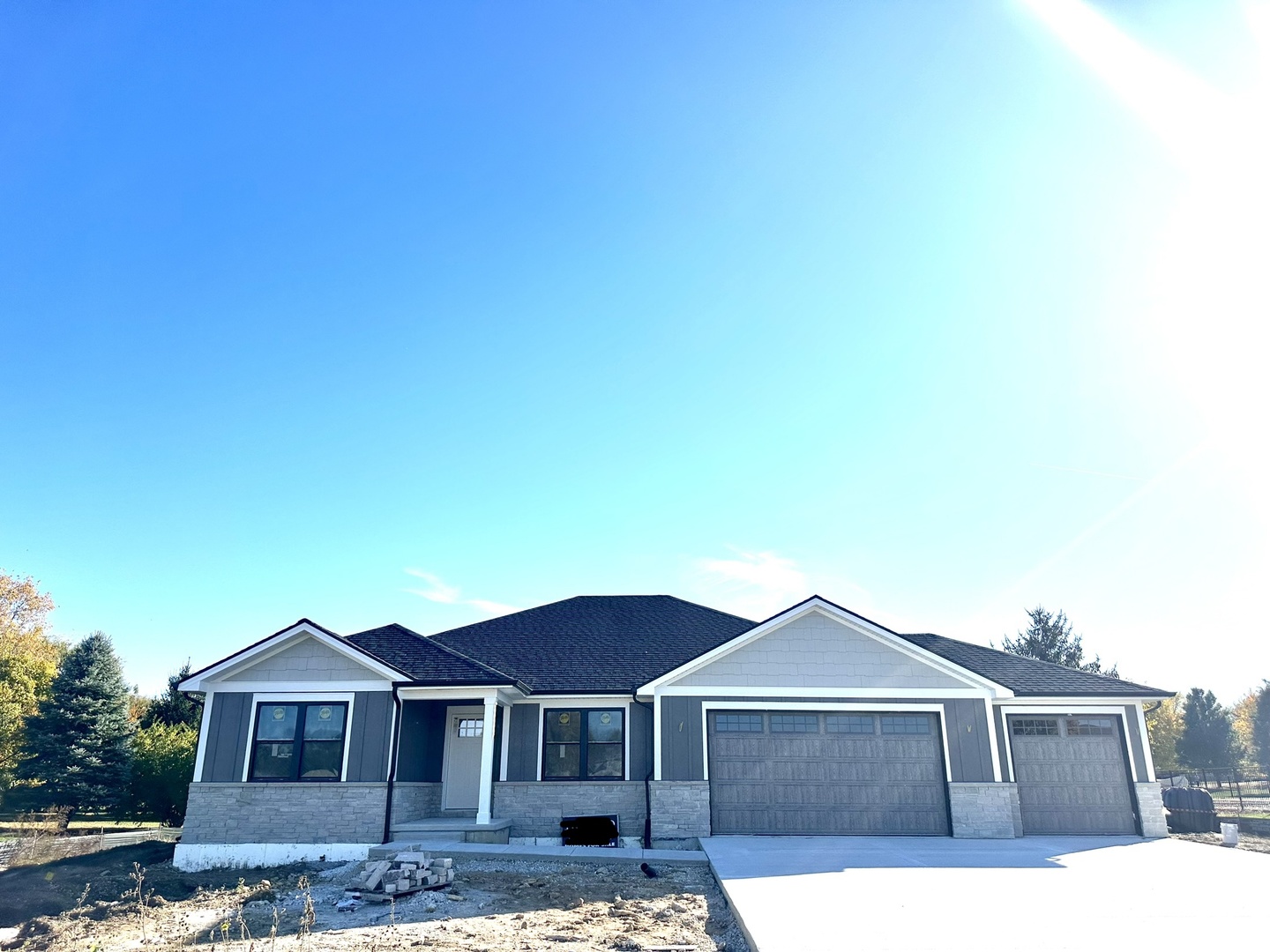 a front view of a house with yard