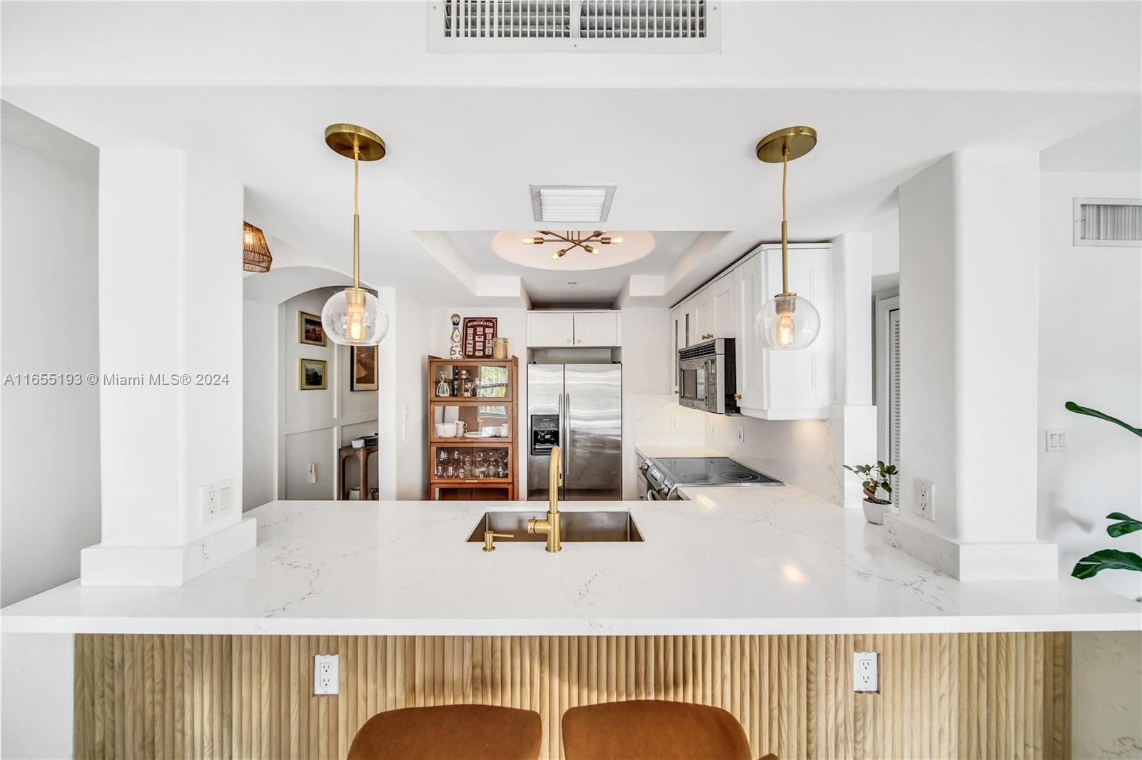 a view of kitchen with dining area