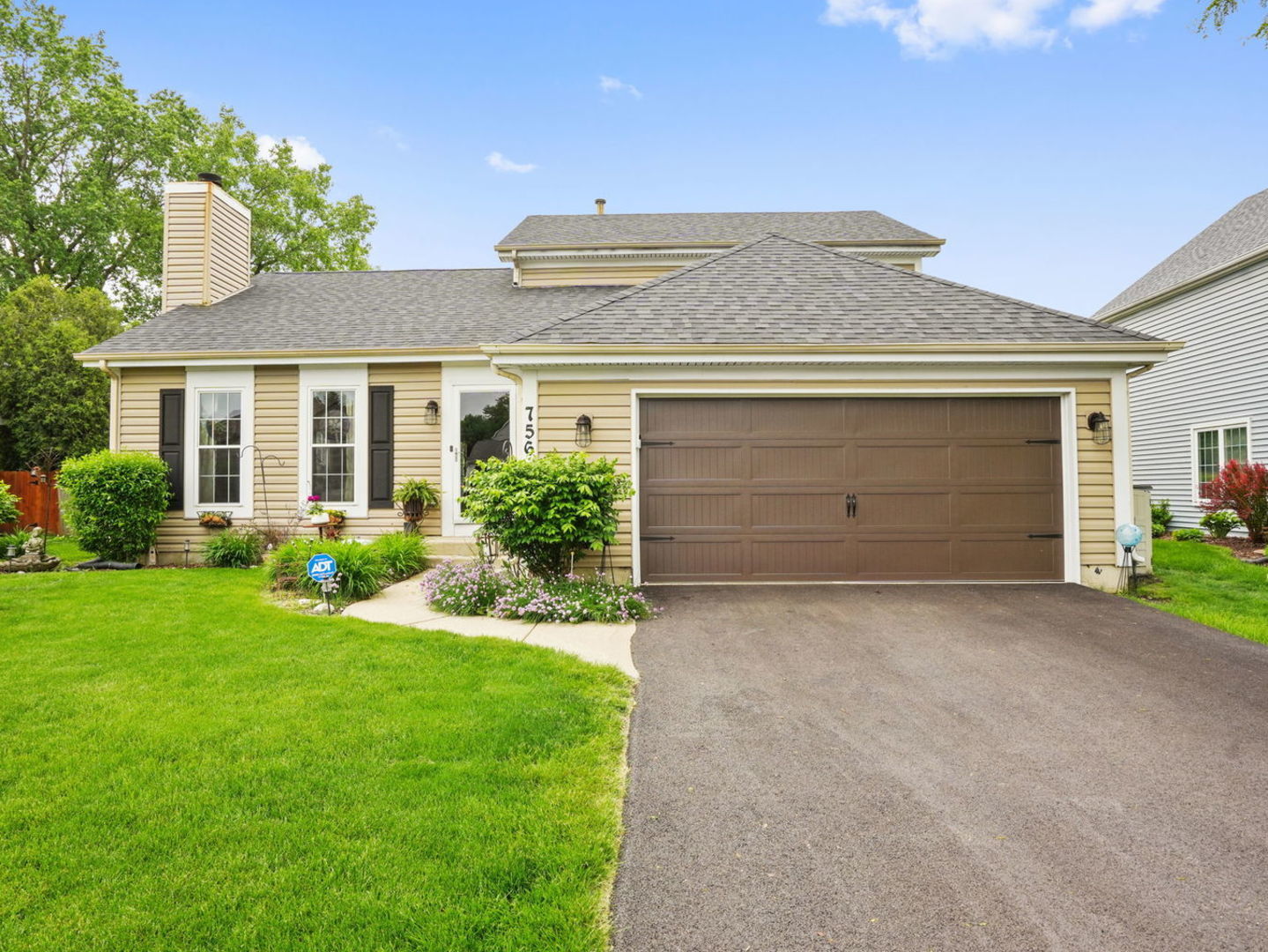 front view of house with a yard