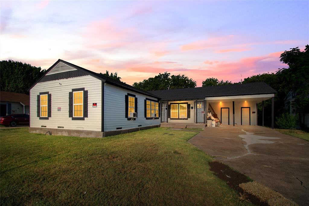 a front view of a house with yard