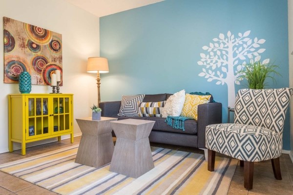 a living room with furniture and a table