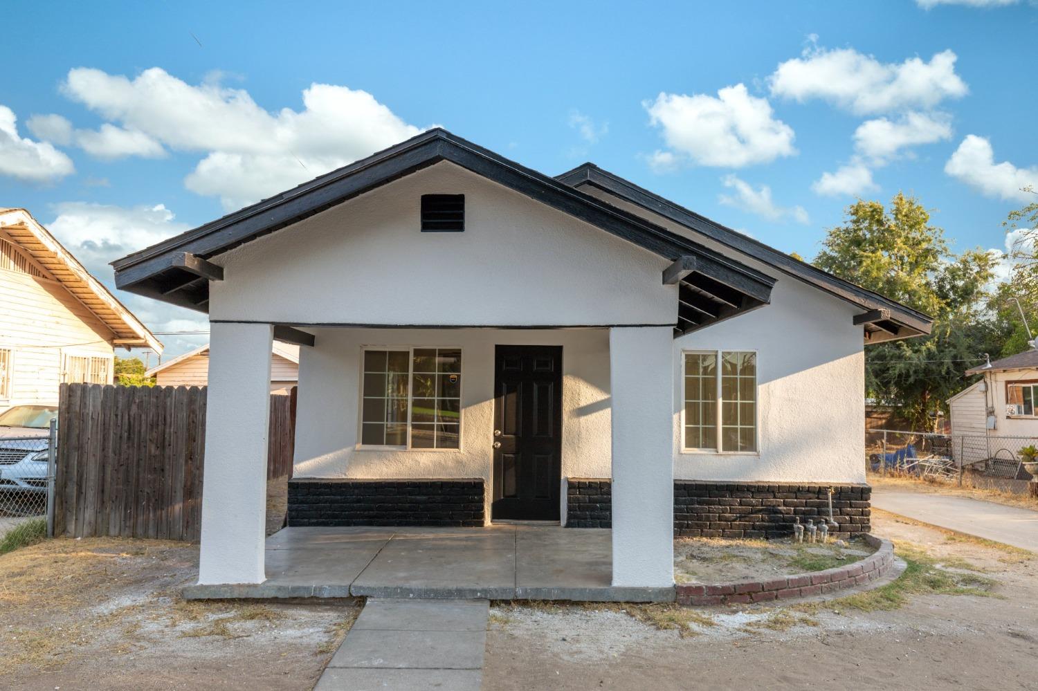 a front view of a house with a garage