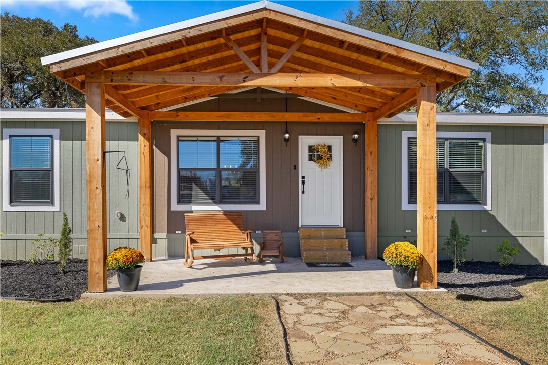 a front view of a house with patio