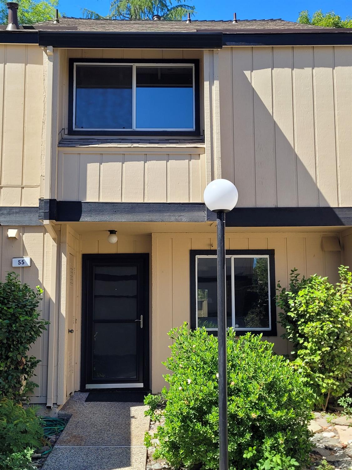 a front view of a house with shower