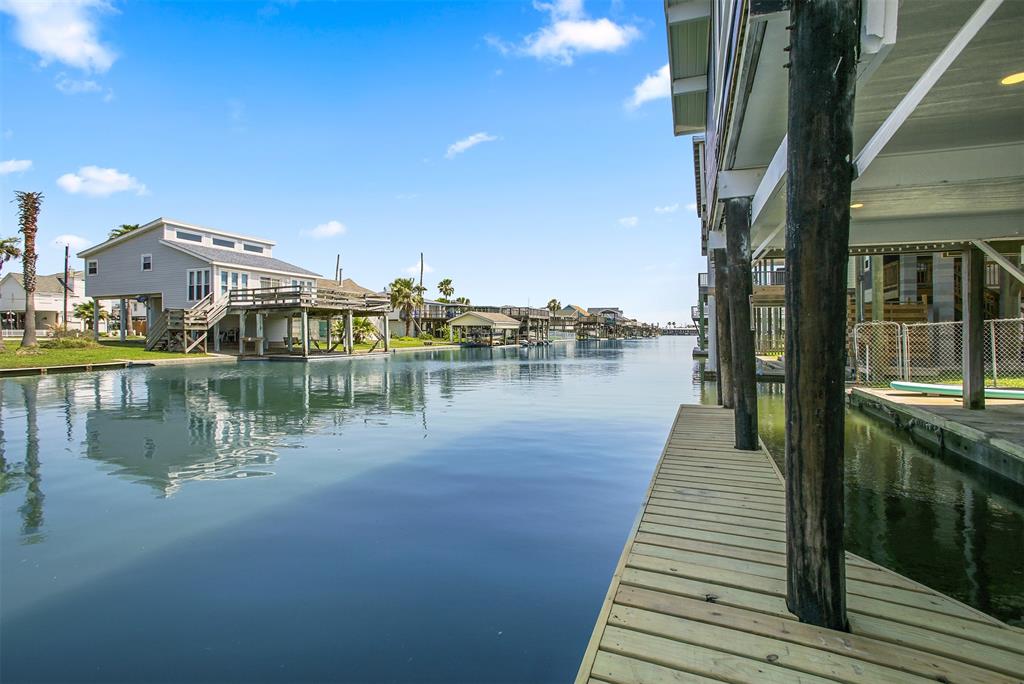 a view of a lake with outdoor seating