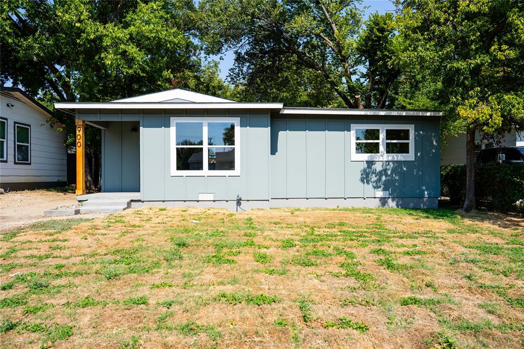 a house with trees in the background