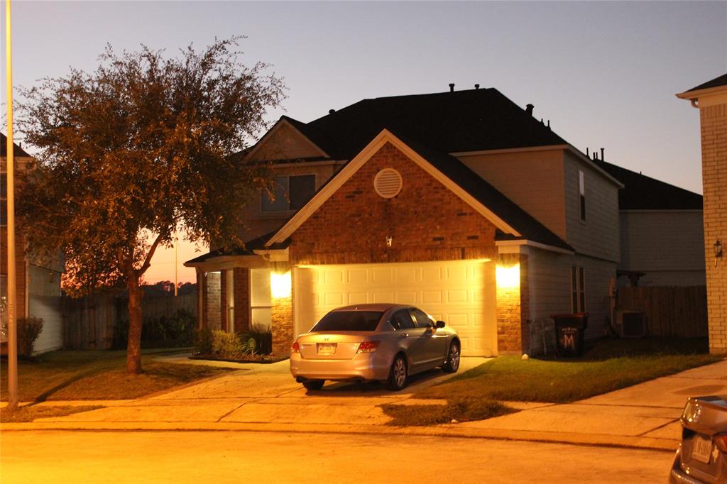 a car parked in front of a house