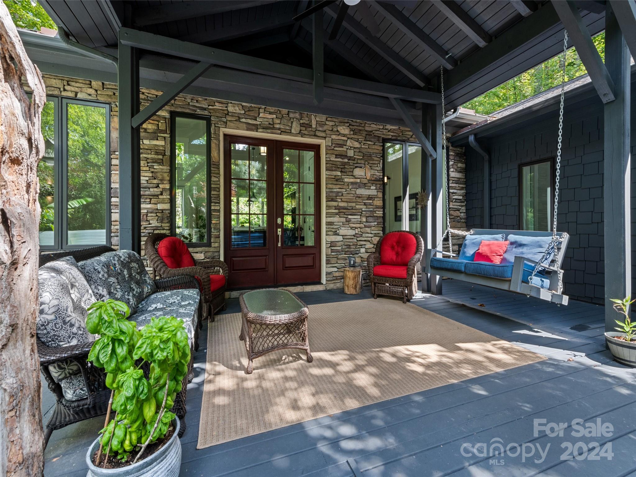 a living room filled with furniture and garden