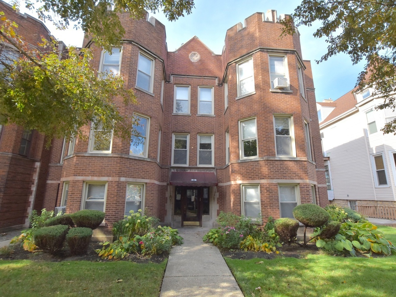 a front view of a multi story residential apartment building