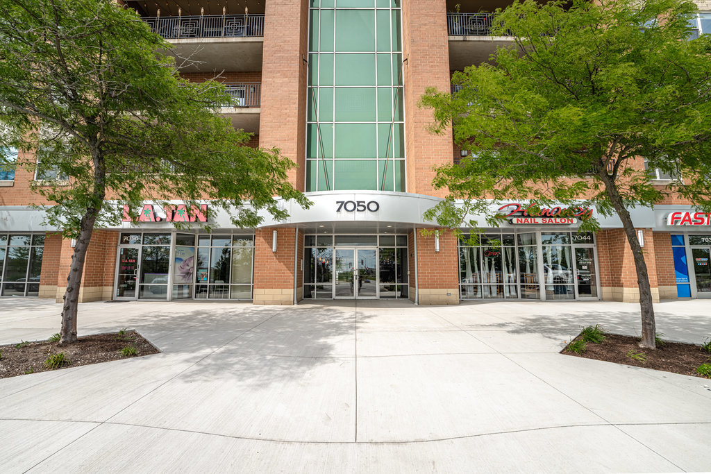 a front view of a building with street view