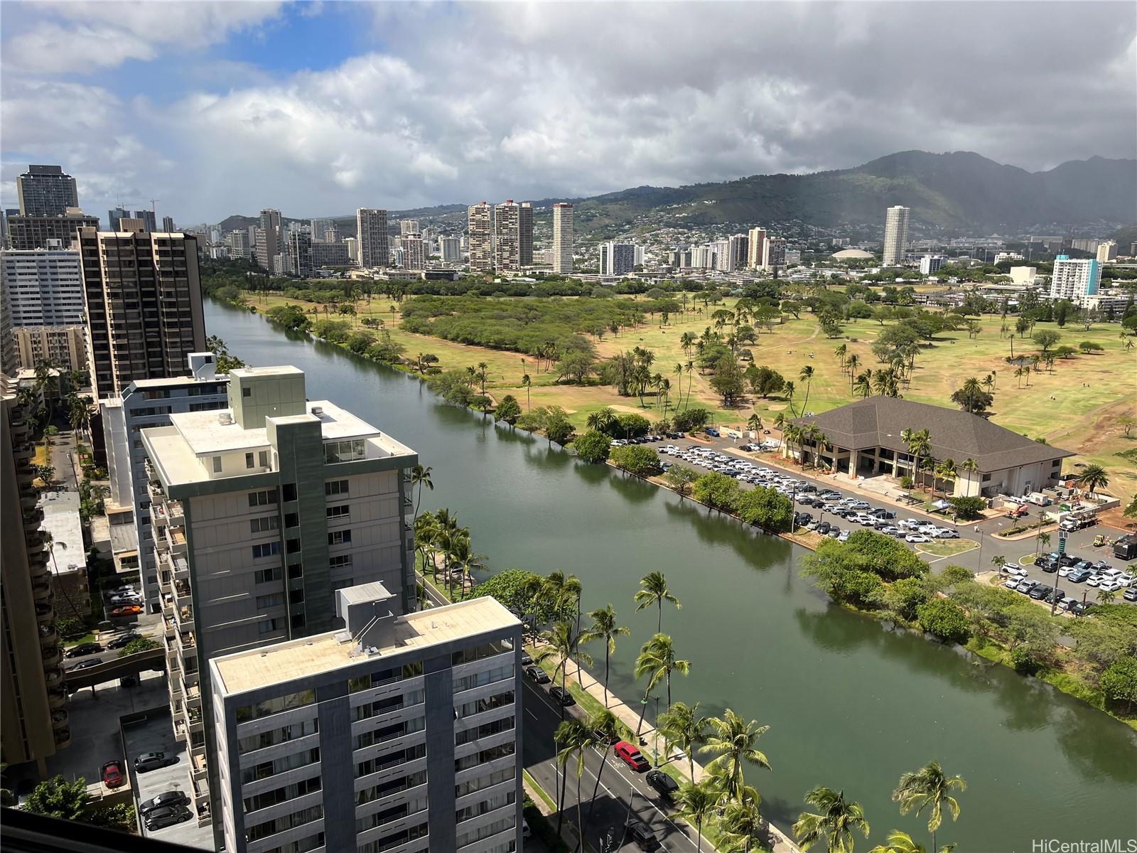 a view of a city and lake