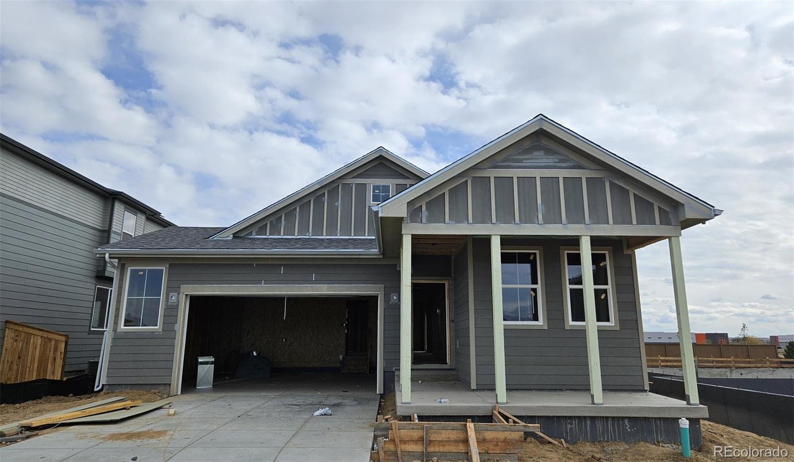 a front view of a house with yard