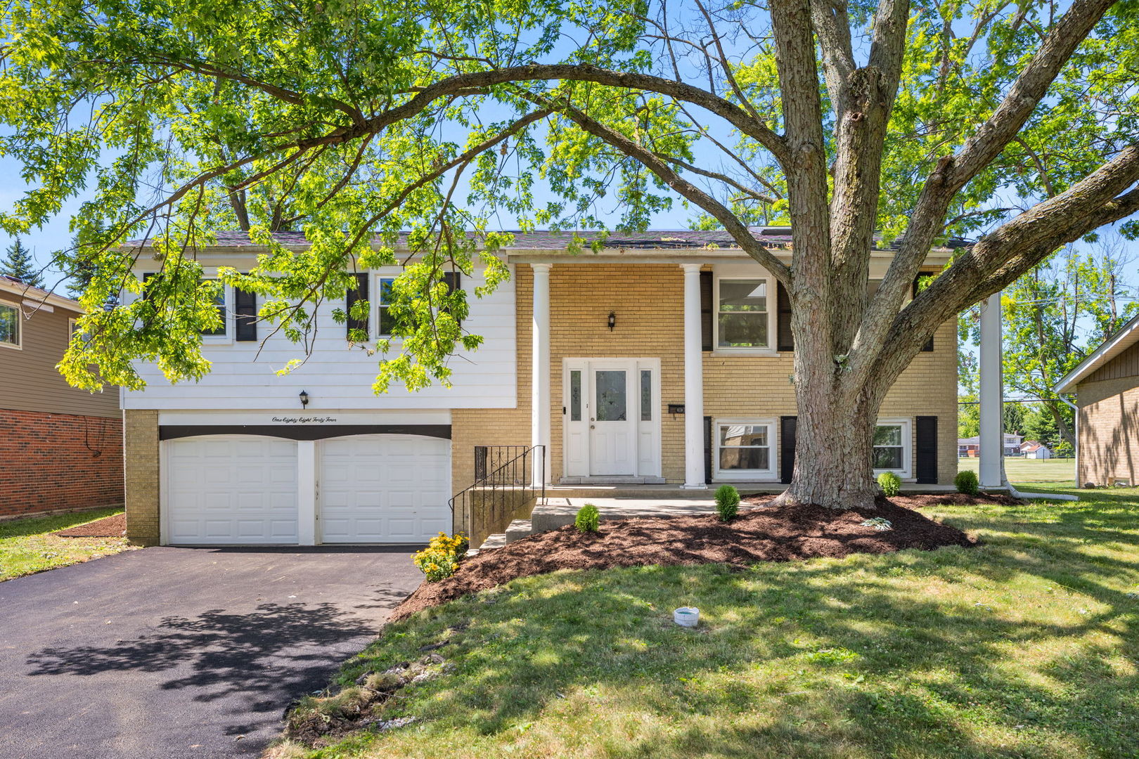 a front view of house with yard