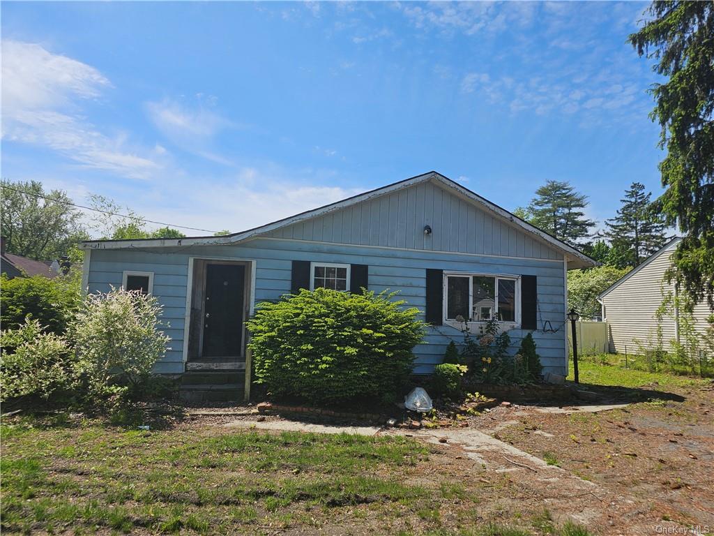 front view of house with a yard