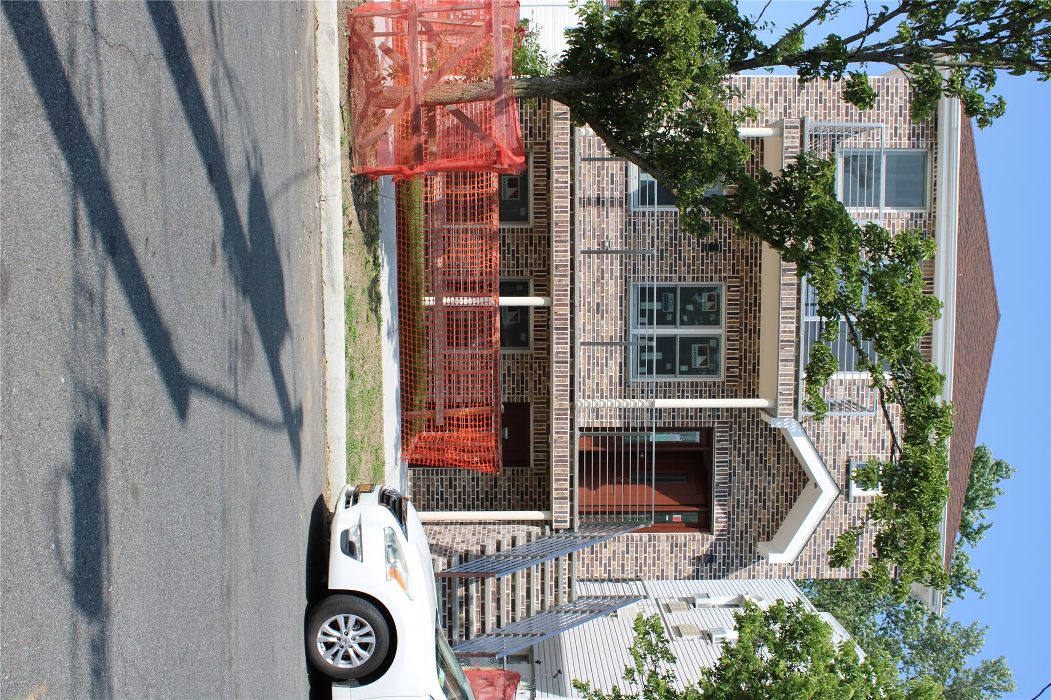 View of front of house with a balcony