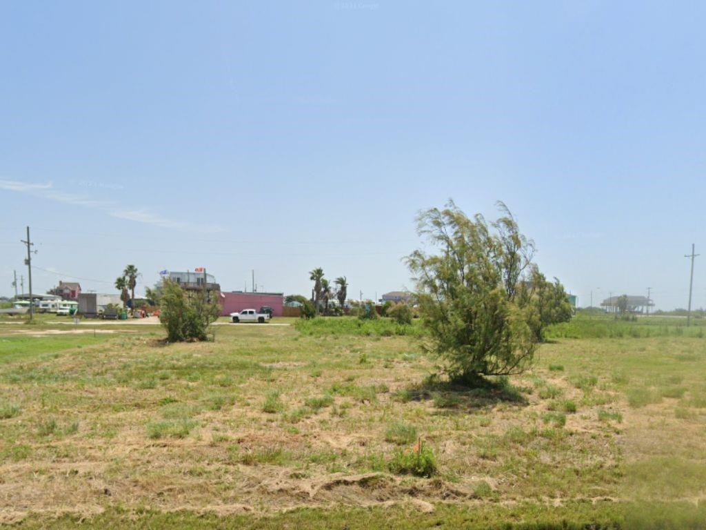 a view of a lake with a houses