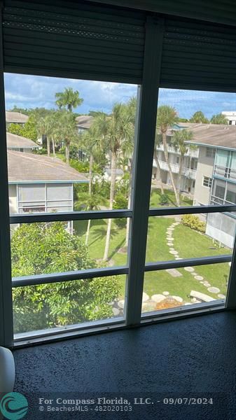 a view of a large window with an outdoor space