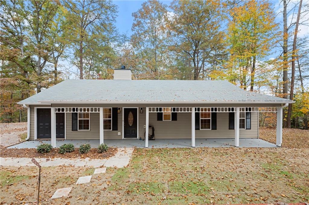 front view of a house with a yard