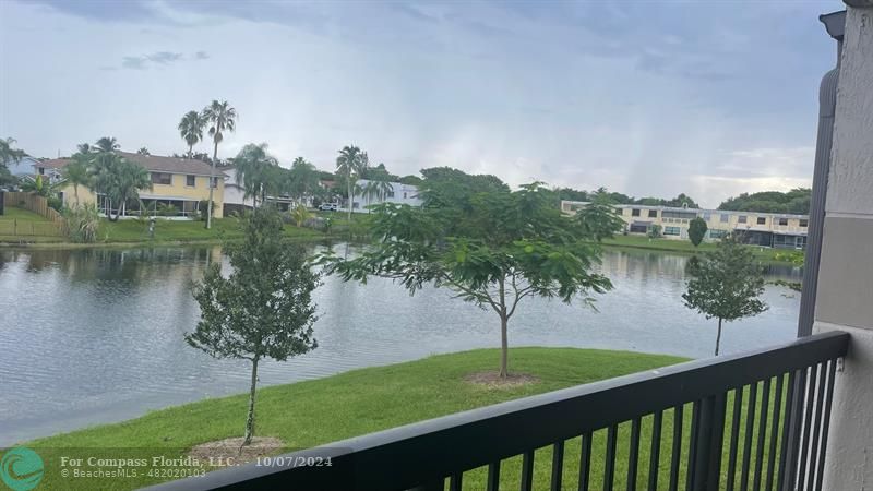 a view of a lake from a balcony