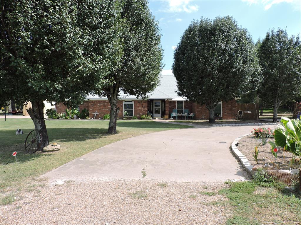 a view of outdoor space with deck and tree