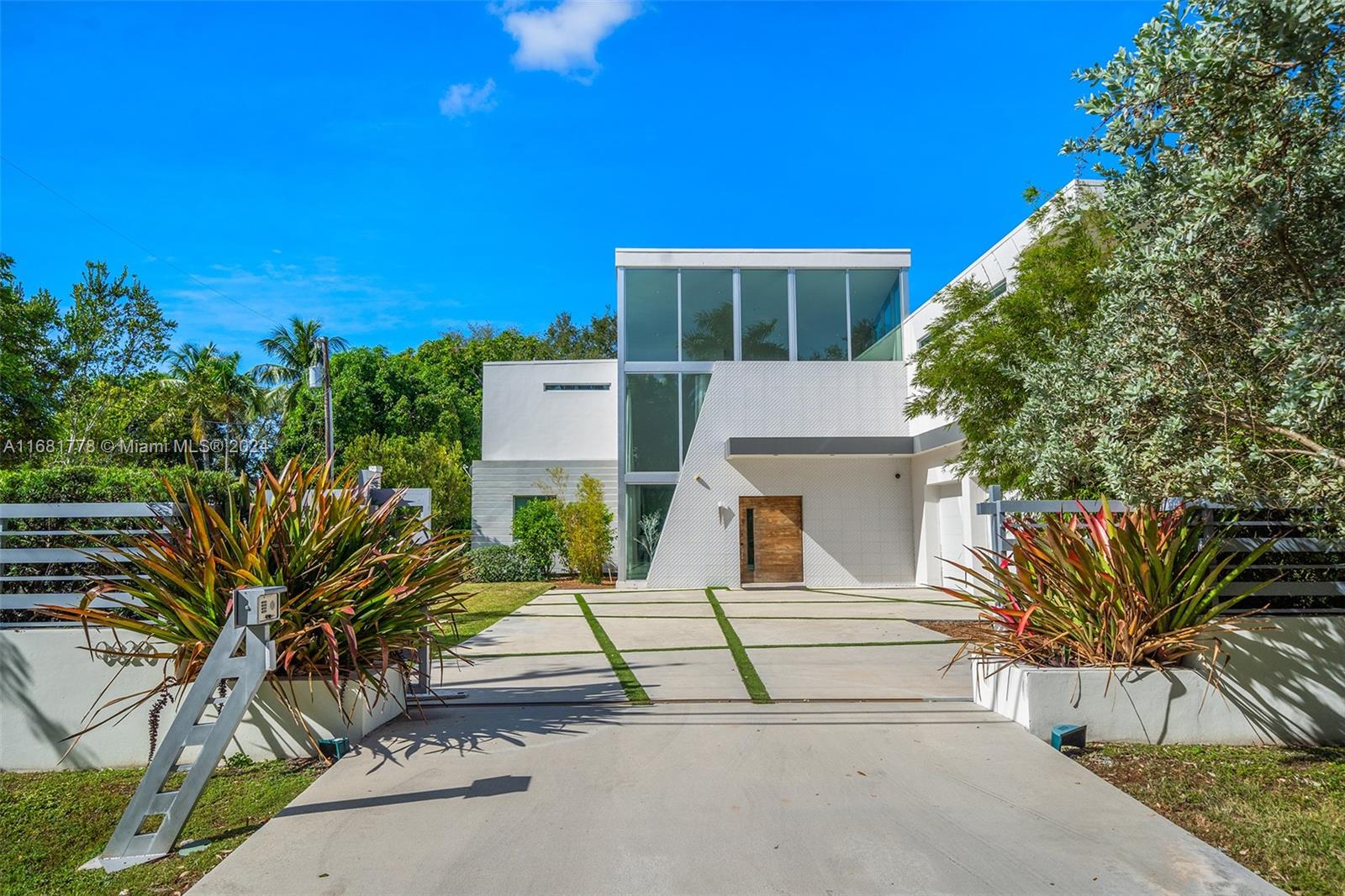 a house with trees in front of it