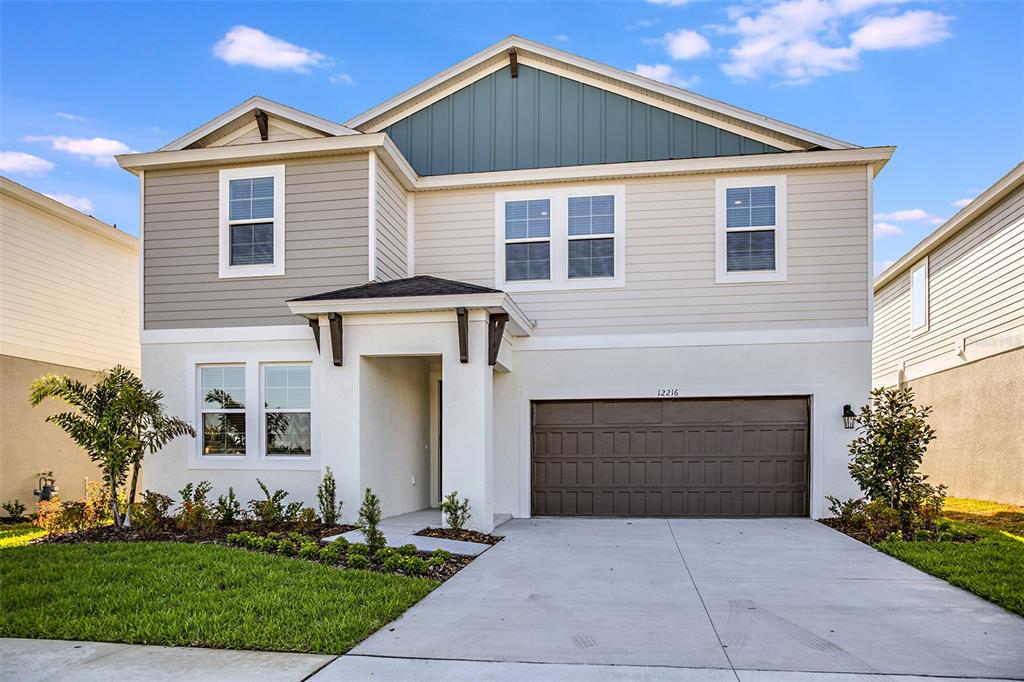 a front view of a house with yard