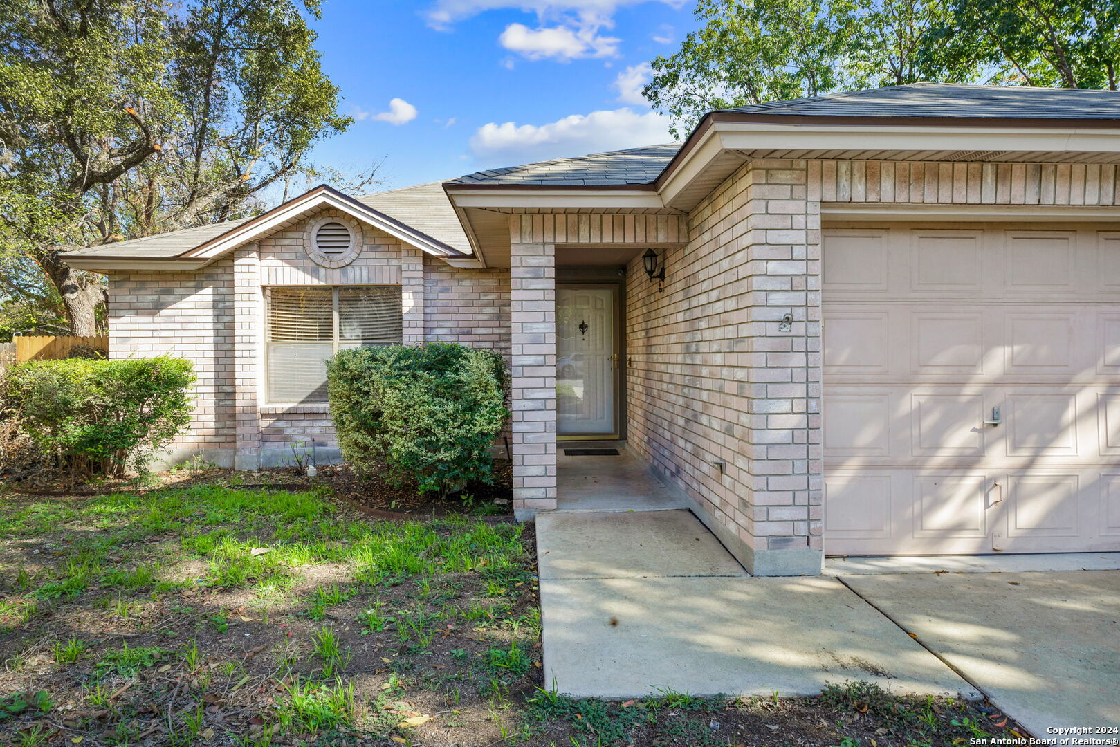 a view of front of house with a yard