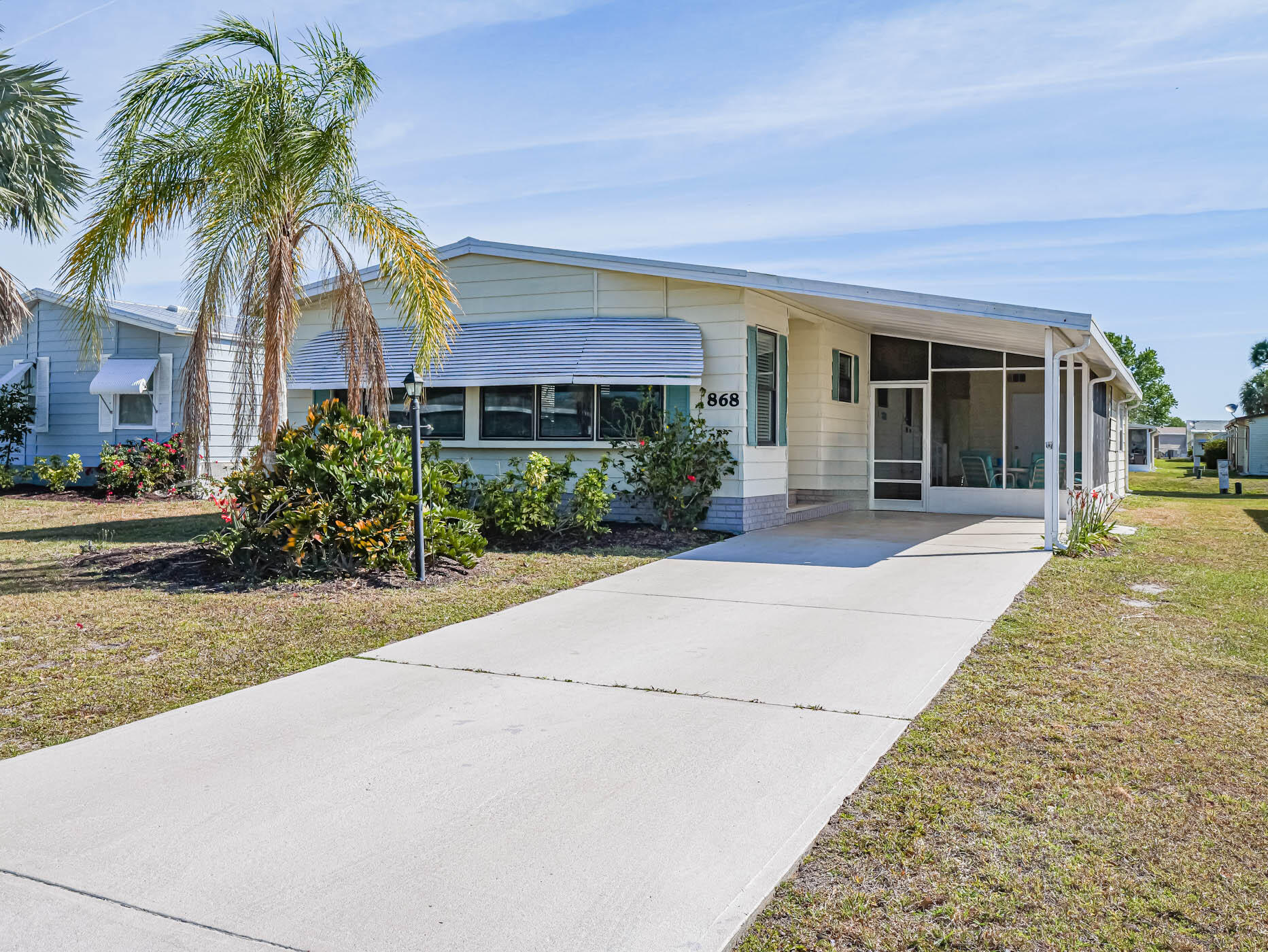 front view of a house with a yard