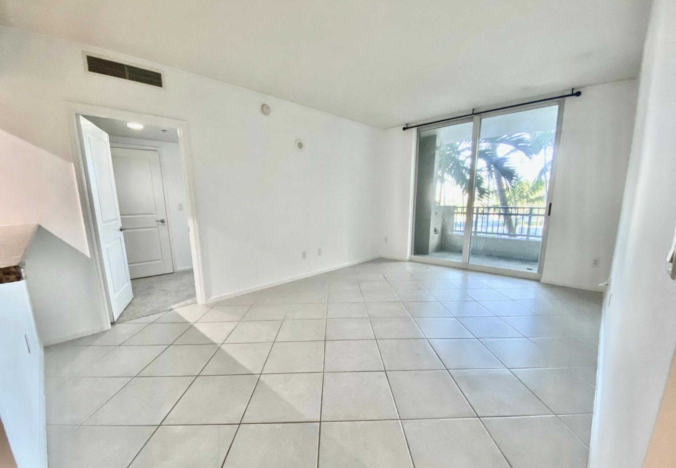 a view of an empty room and window