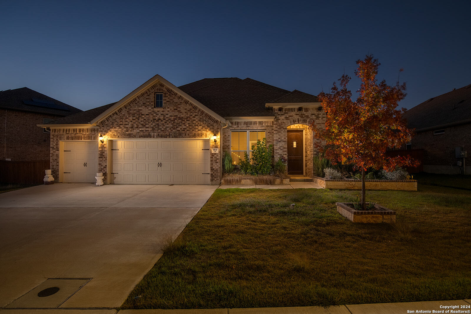 a house view with a garden space