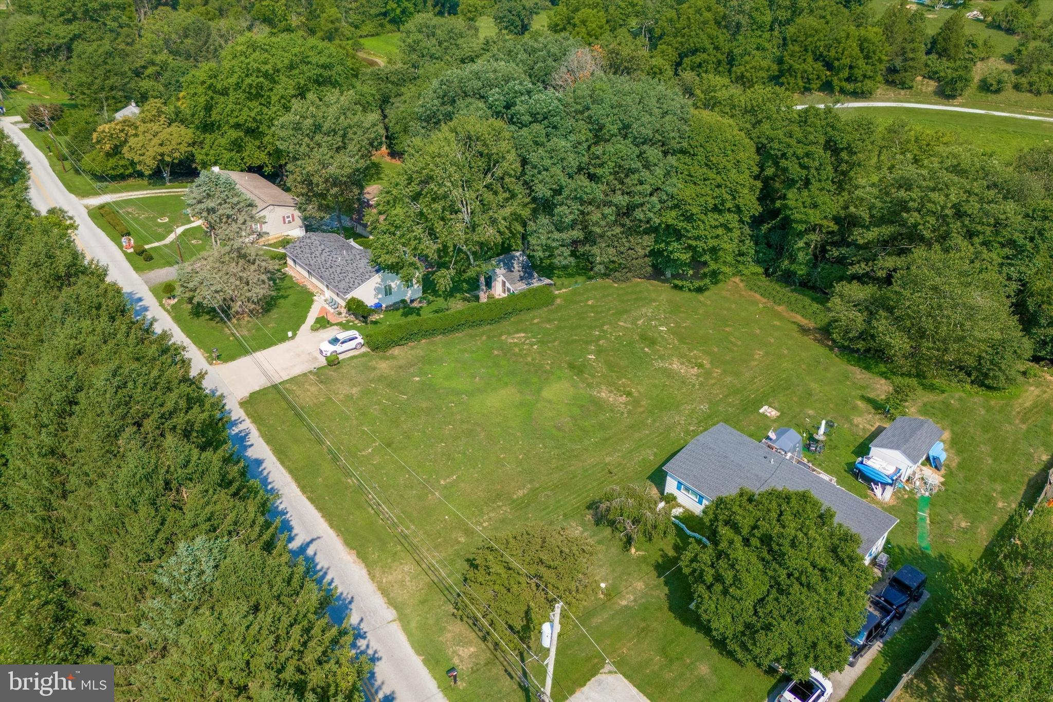 a view of a back yard of the house