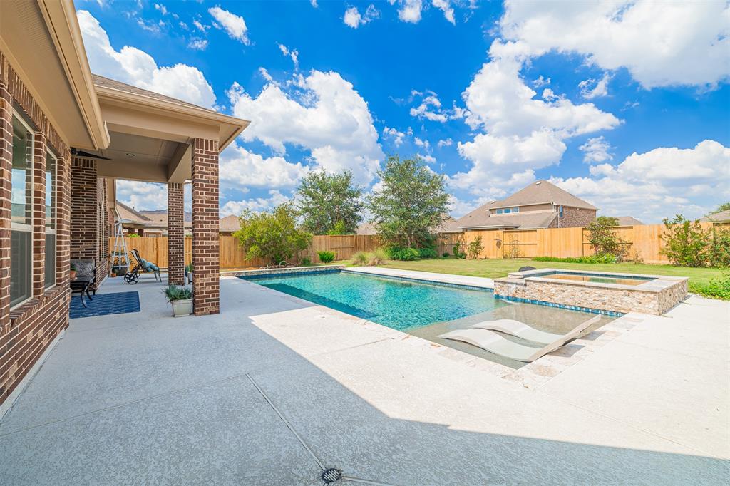 Texas summers simply can't be beat when you can enjoy your own private backyard paradise! This sparkling, heated inground pool and raised spa provide the perfect "get away" right at your back door.