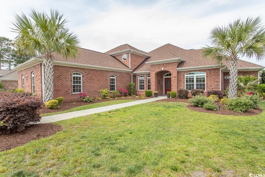 View of front of property featuring a front lawn