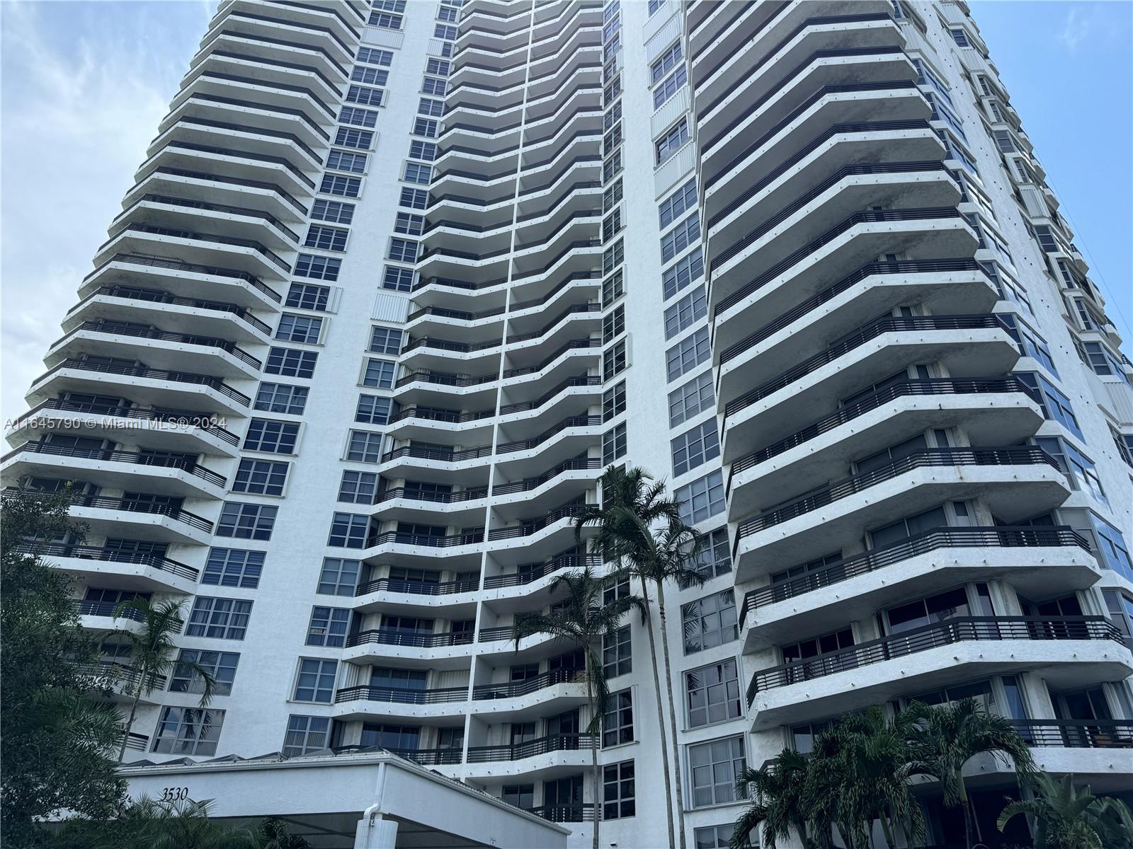 a view of a city with tall buildings