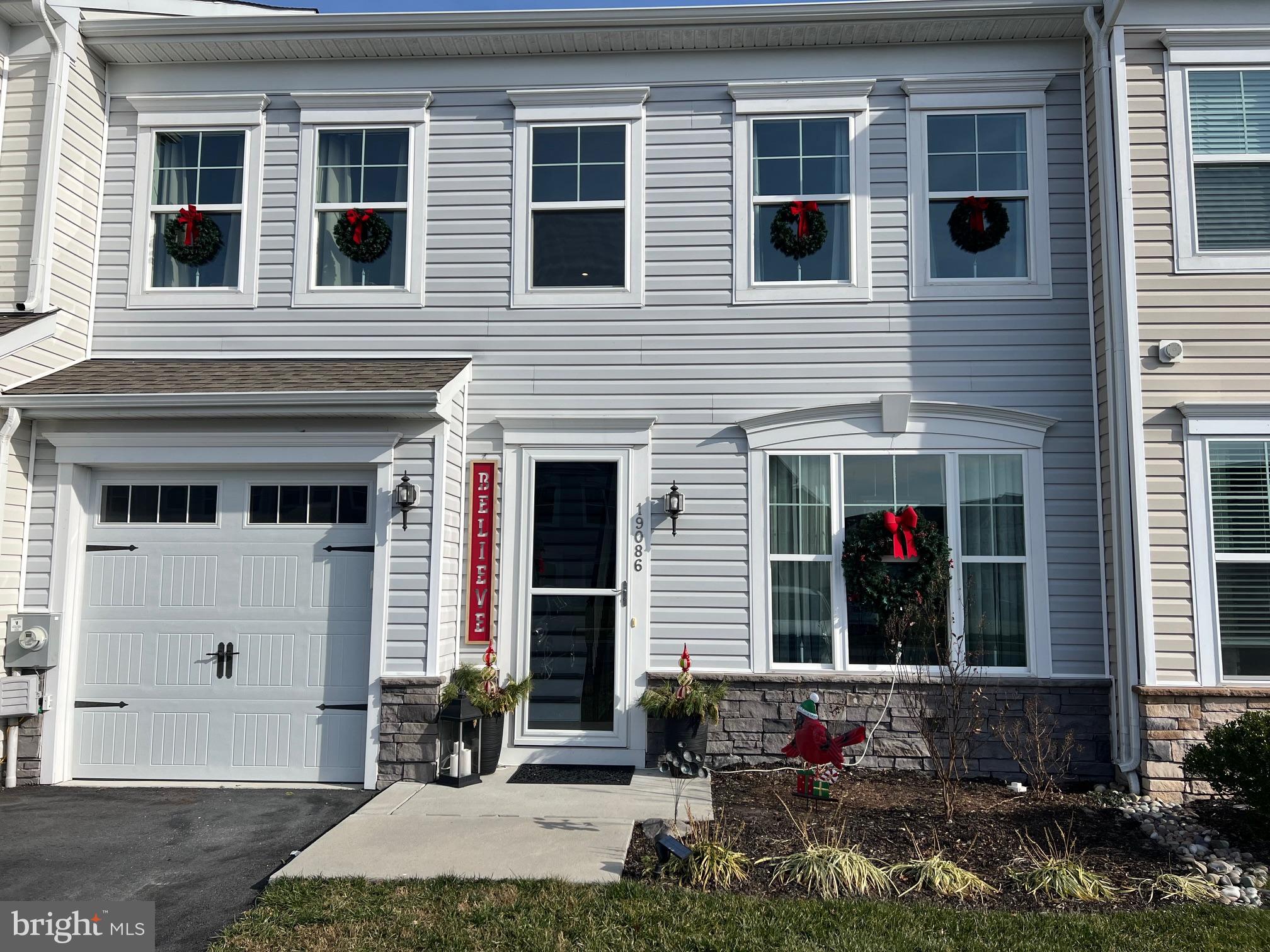 a front view of house with yard