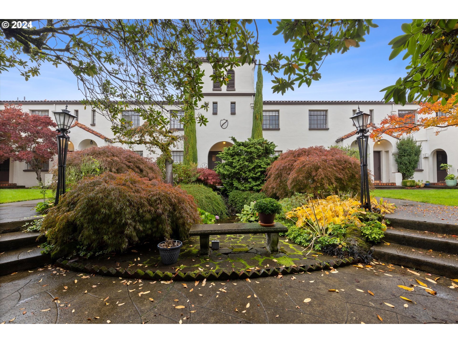 a view of a house with a garden