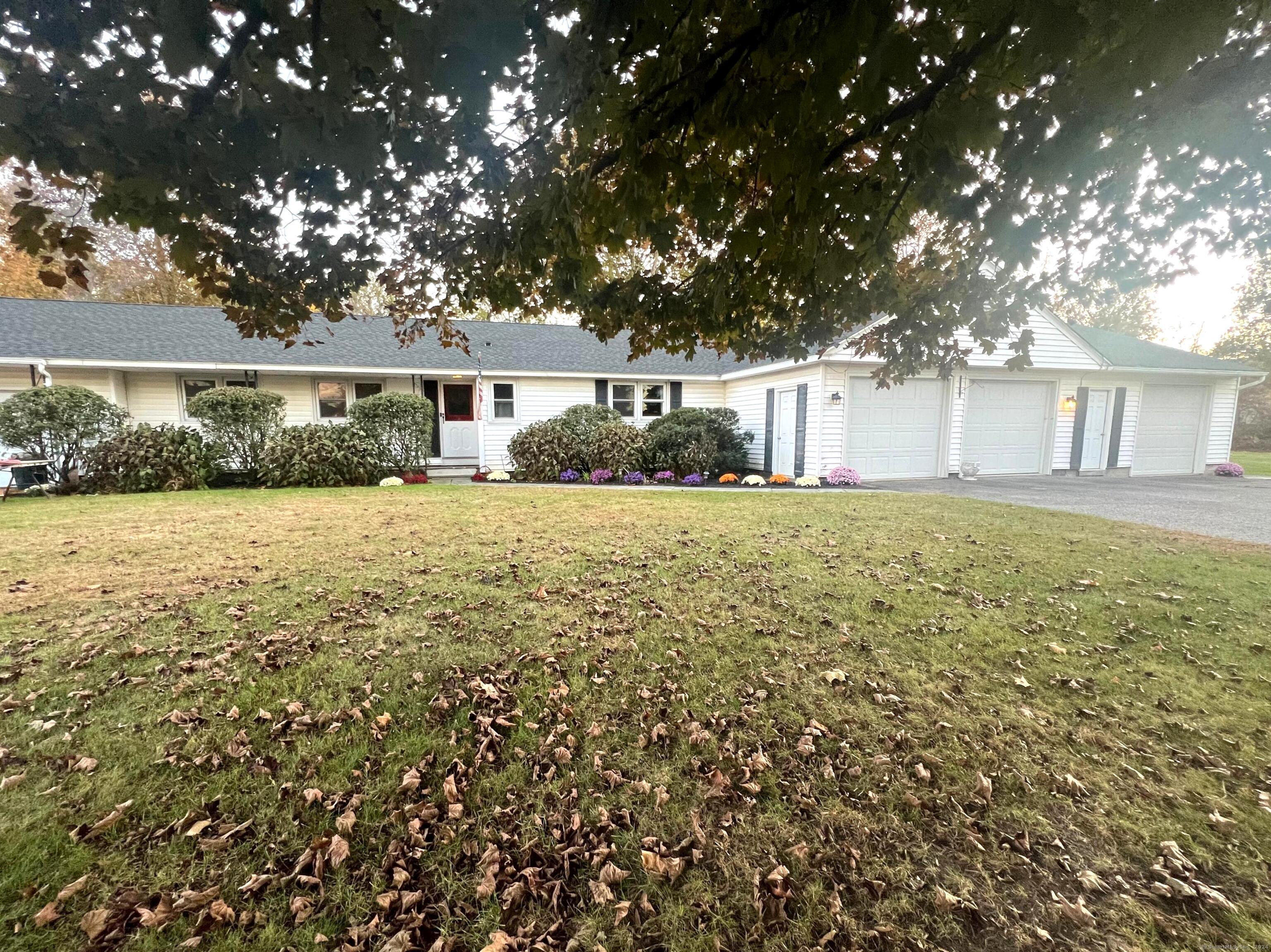 front view of a house with yard