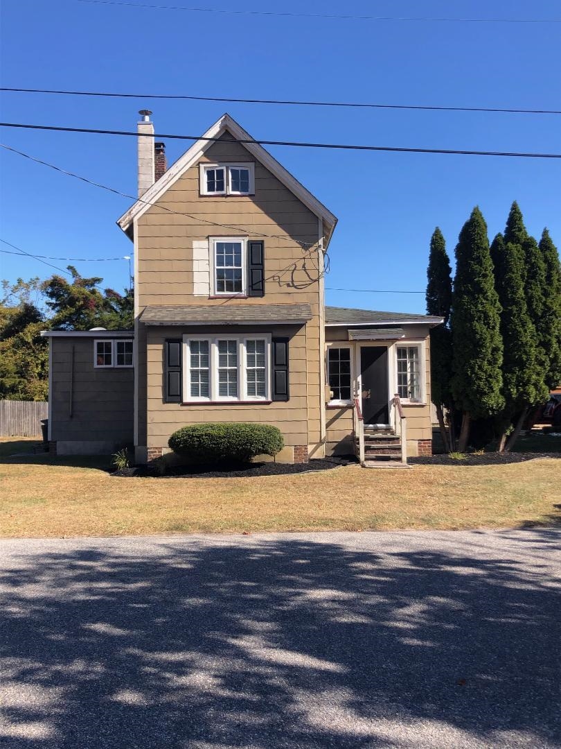 a front view of a house with swimming pool