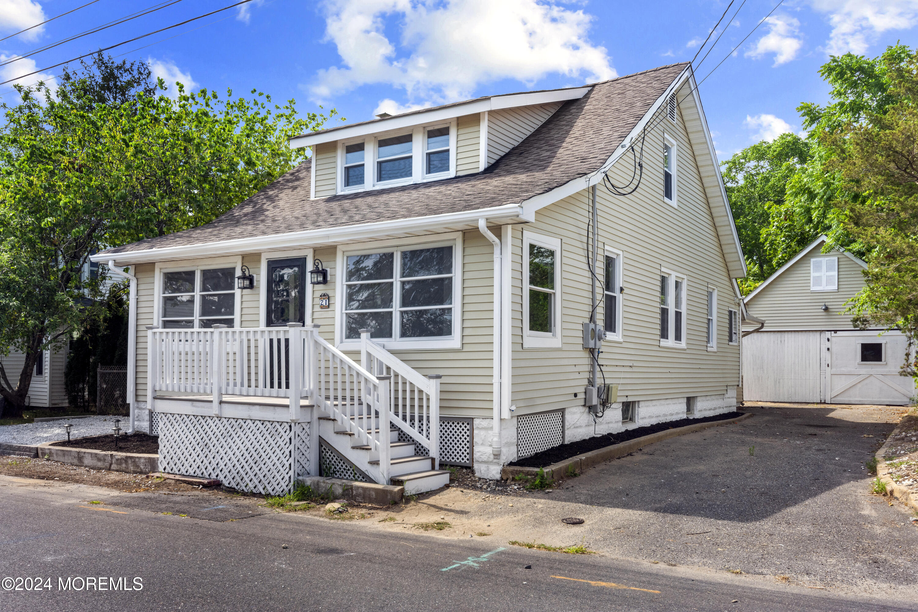 a front view of a house with a garage