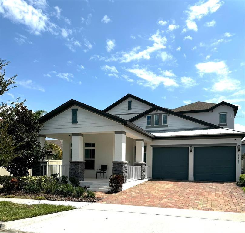 a front view of a house with yard