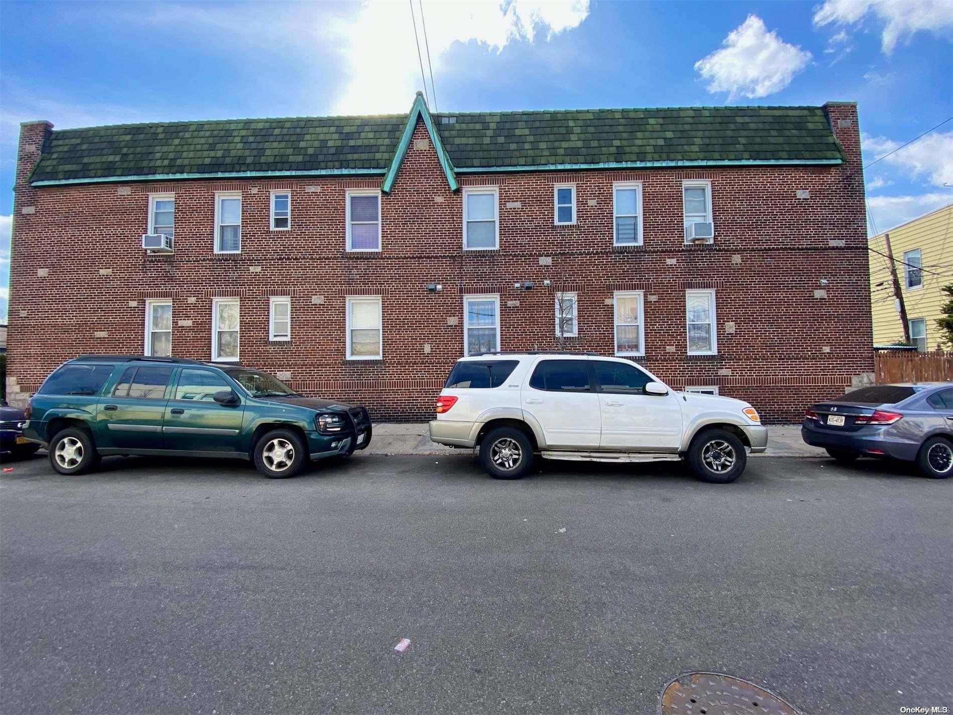 a car parked in front of a house