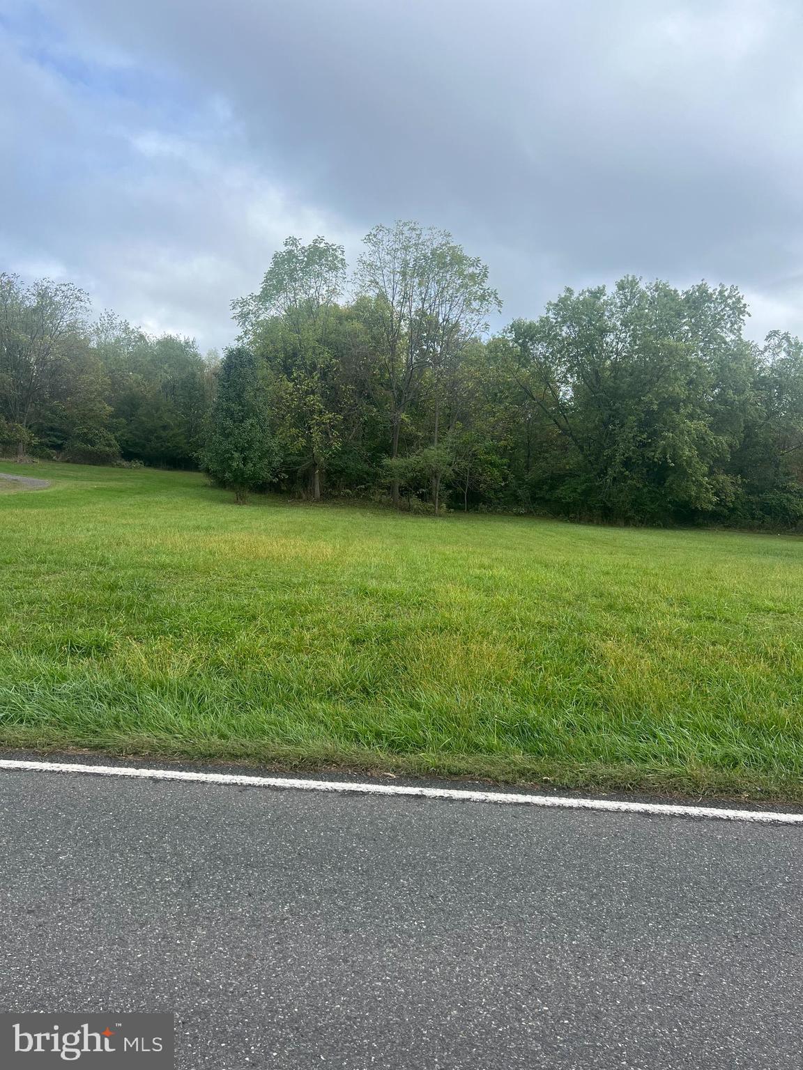 a view of a field with an outdoor space