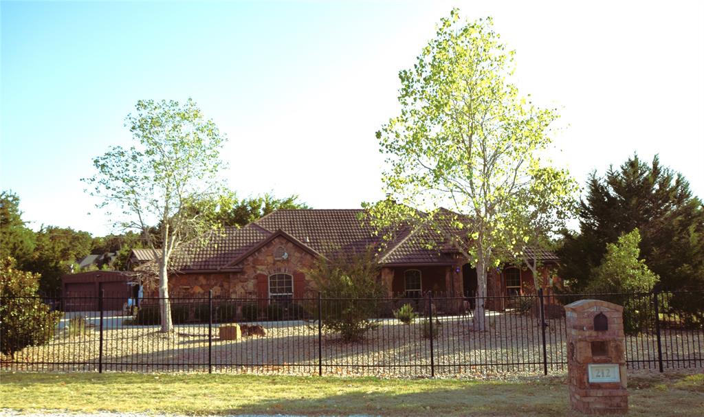 a swimming pool with outdoor seating and yard