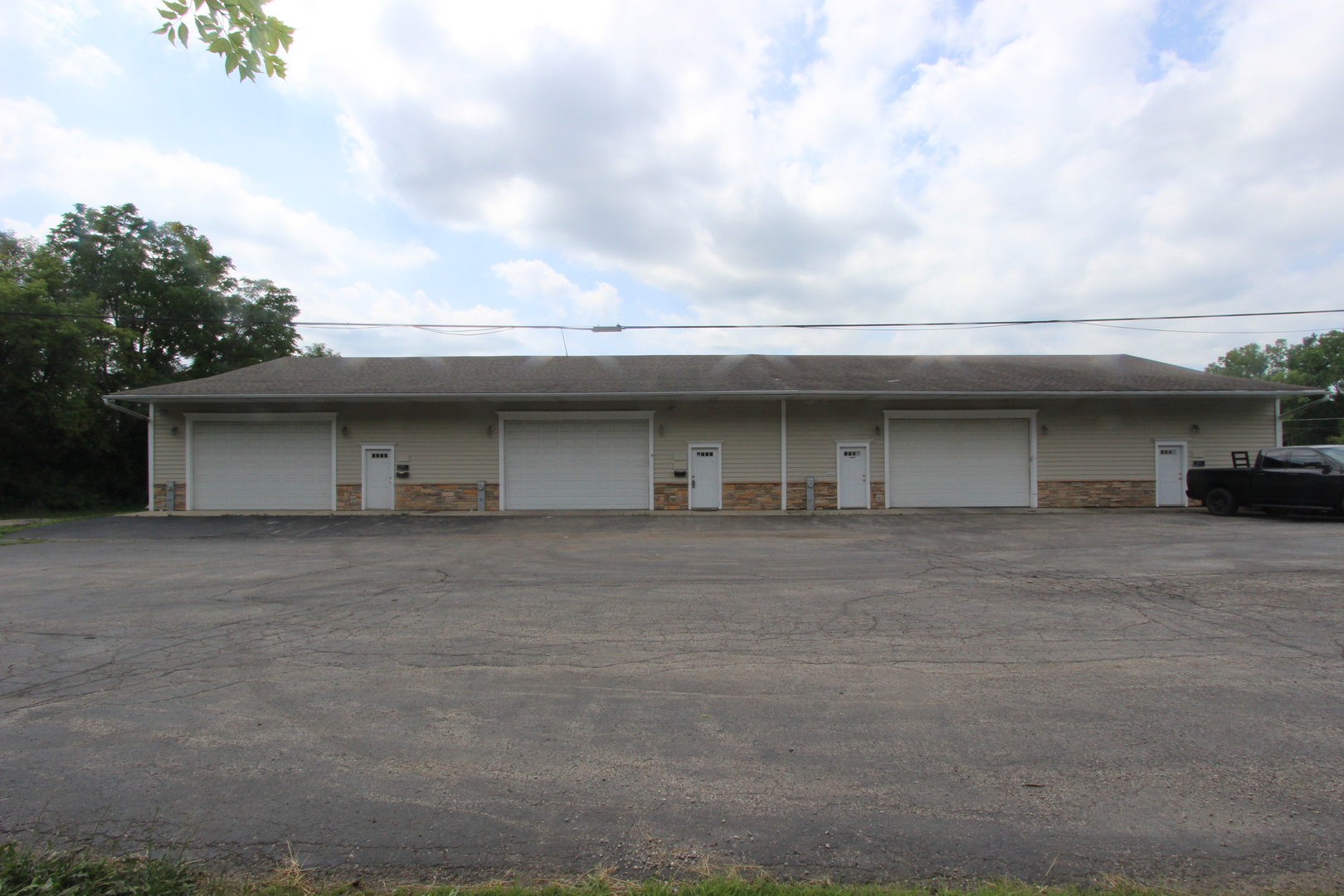 a view of a house with a garage