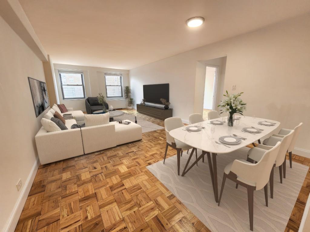 Dining area featuring light parquet flooring