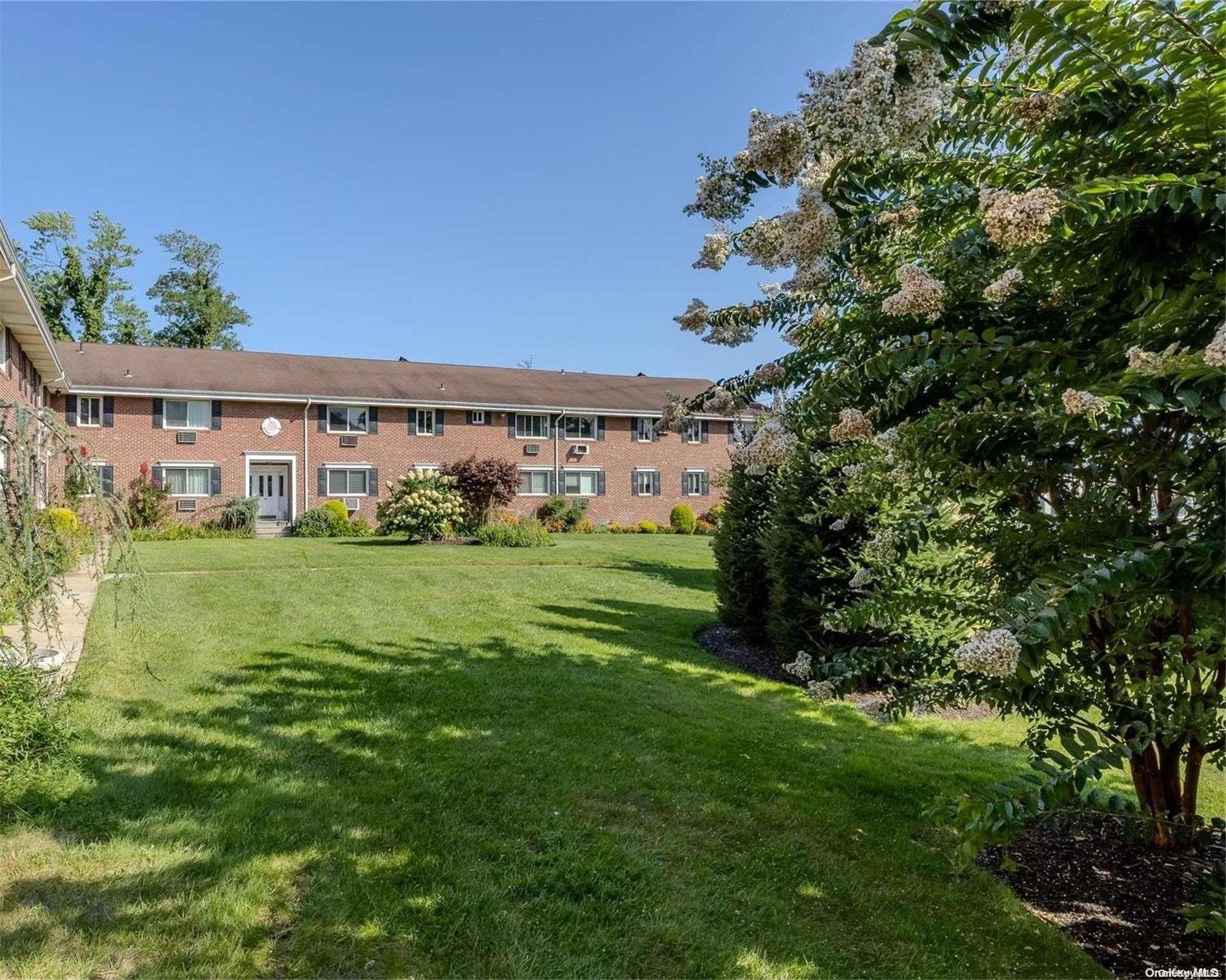 a view of a house with a big yard