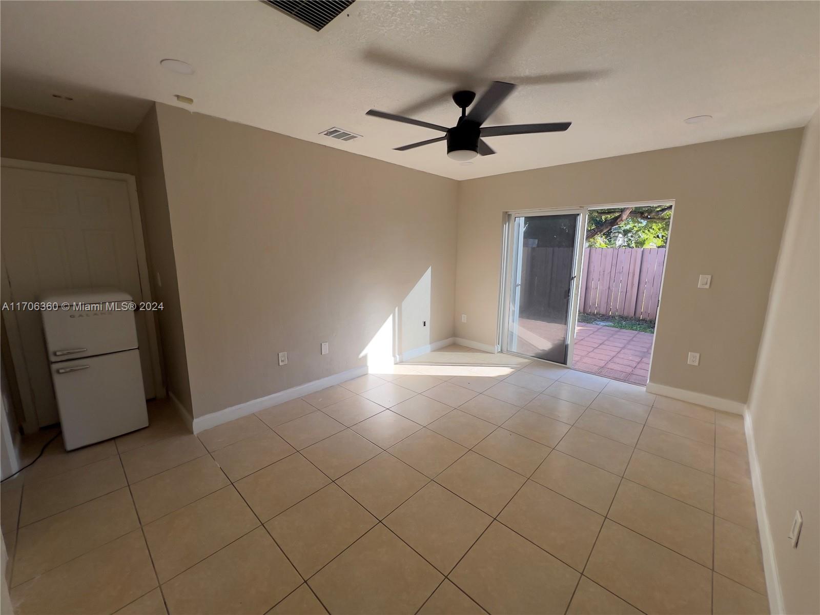 a view of a livingroom with a staircase